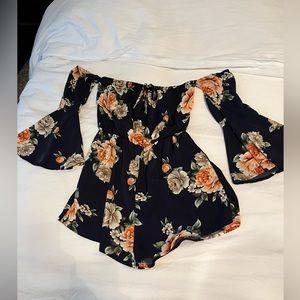 Adorable off-shoulder navy blue floral romper